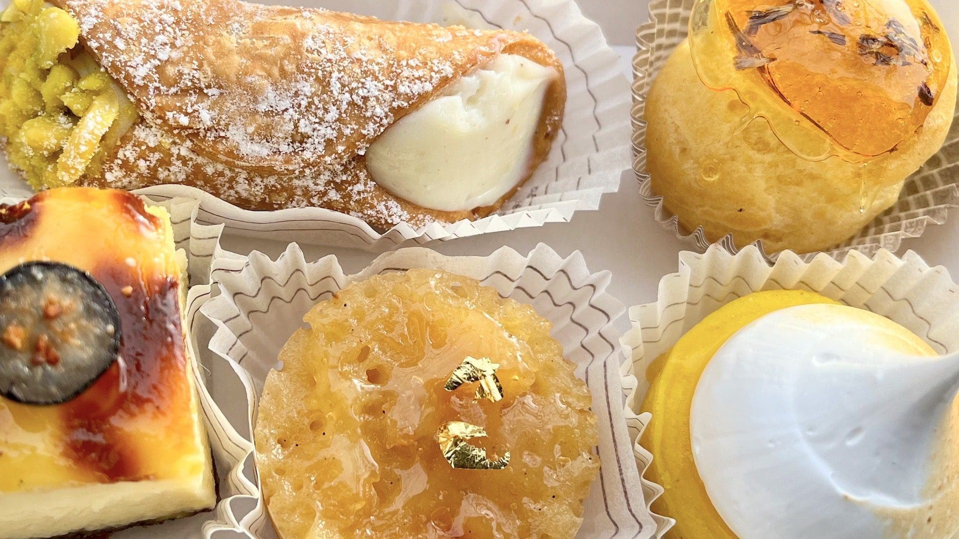 Beautiful miniature Italian pastries like cheesecake apple pie and more from Walk With Us Tours in Berlin